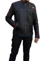 Close-up of the hand-stitched N7 logo on a black leather gaming jacket.