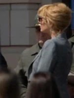 Beth Dutton wearing a stylish grey office blazer from Yellowstone showing her classy western business look