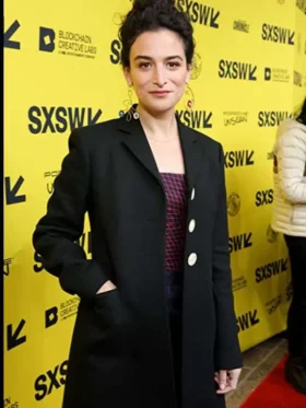 Once Premiere Black Coat Jenny Slate wearing a classic black coat at the movie premiere, styled elegantly with modern red carpet fashion.