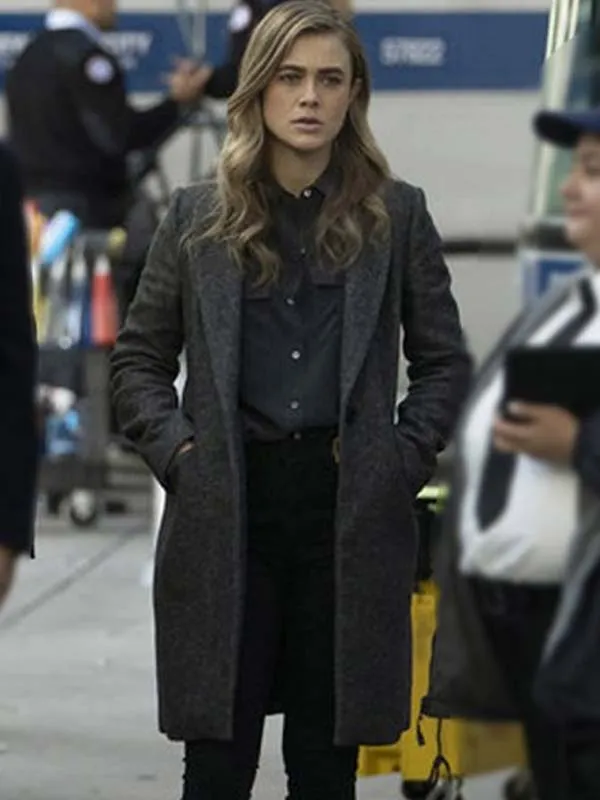 Michaela Stone Grey Coat shown in a casual outdoor scene, highlighting her sophisticated and minimal style