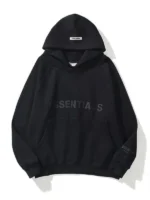 Black Fear of God Essentials hoodie showing a clean fit with hooded collar, rib cuffs, and kangaroo pocket for a sleek streetwear look.