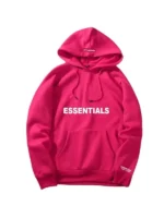 Red Fear of God Essentials hoodie featuring hooded collar, rib cuffs, and kangaroo pocket for a bold and clean streetwear style.