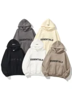 Fear of God Essentials hoodie showing multiple color options including cream, beige, tan, grey, black, white, red, and yellow.