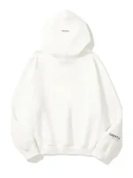 Back side view of white Fear of God Essentials hoodie showing relaxed fit, smooth finish, and full coverage hood for casual styling.
