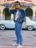 Marty McFly full outfit denim jacket jeans and sneakers outside theater in Back to the Future movie still