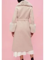 Beige fur collar coat inspired by Max Meladze in The Recruit, showing classic winter style with luxury comfort.