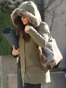 Meghan Markle wearing a Harry & Meghan Markle fur trim parka with a cozy hood and winter-ready style