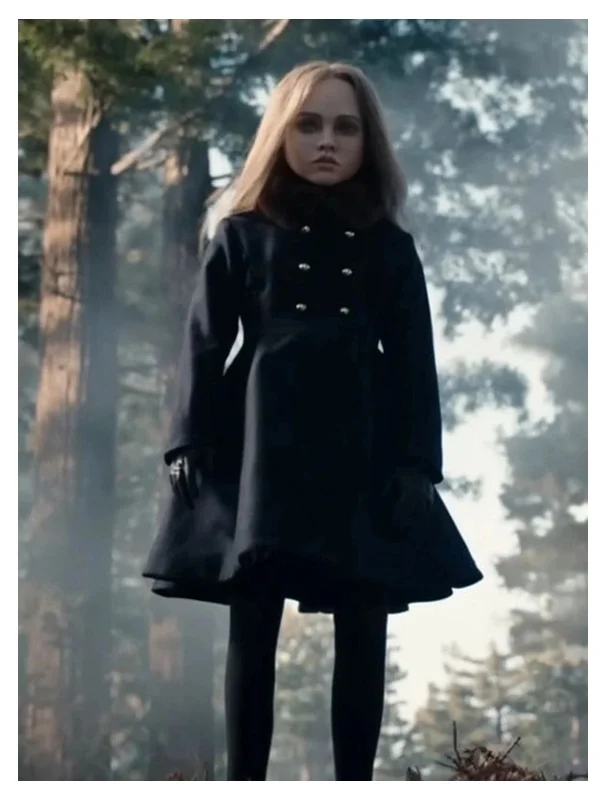 Amie Donald Black Coat Amie Donald wearing a black coat as M3GAN in the film M3GAN