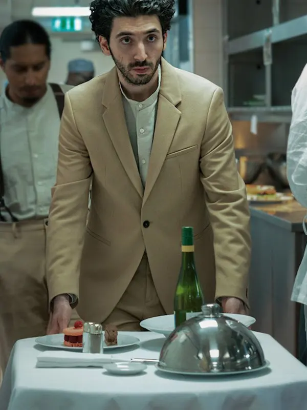 A tailored men's blazer crafted from premium suiting fabric with a classic lapel collar and single-button closure.