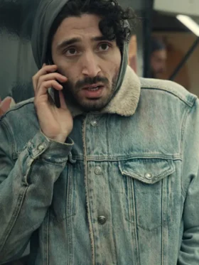 A classic denim jacket for men featuring a warm shearling-lined collar and a traditional button-front closure.