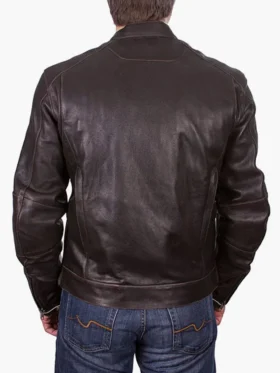 Close-up of a men's brown leather jacket with zipper cuffs and a dual zipper and snap-tab front closure for a secure fit.