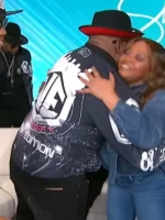 New Edition tour jacket with fleece-style inner comfort and zip front, designed for warmth and casual wear.