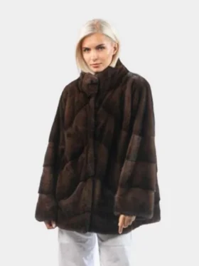 Luxurious faux fur coat for women with a high stand-up collar.
