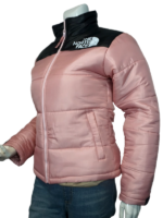 North Face Puffer Jacket Pink left side view highlighting the voluminous baffles and structured athletic fit.