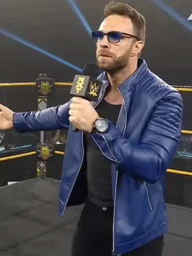 Close-up of a sleek blue motorcycle-style leather jacket with a zippered front and padded sleeves.