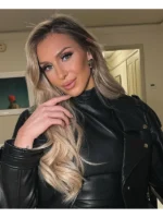 Cropped motorcycle style leather jacket with belted waist detail.