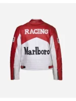 Close-up of a vintage leather racing jacket featuring authentic 1990s embroidered sponsorship patches and a snap-tab collar.