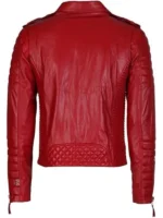 Close-up of a leather biker jacket featuring a snap-tab collar and multiple zipper pockets.