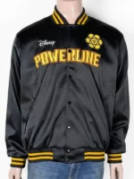 A black Disney Powerline Tour bomber jacket featuring a large yellow "Stand Out" tour graphic on the back, ribbed knit trim, and a classic 90s varsity silhouette.