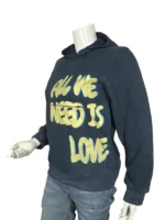 All We Need Is Love Hoodie left side view highlighting the relaxed sleeve drape and reinforced ribbed cuffs.