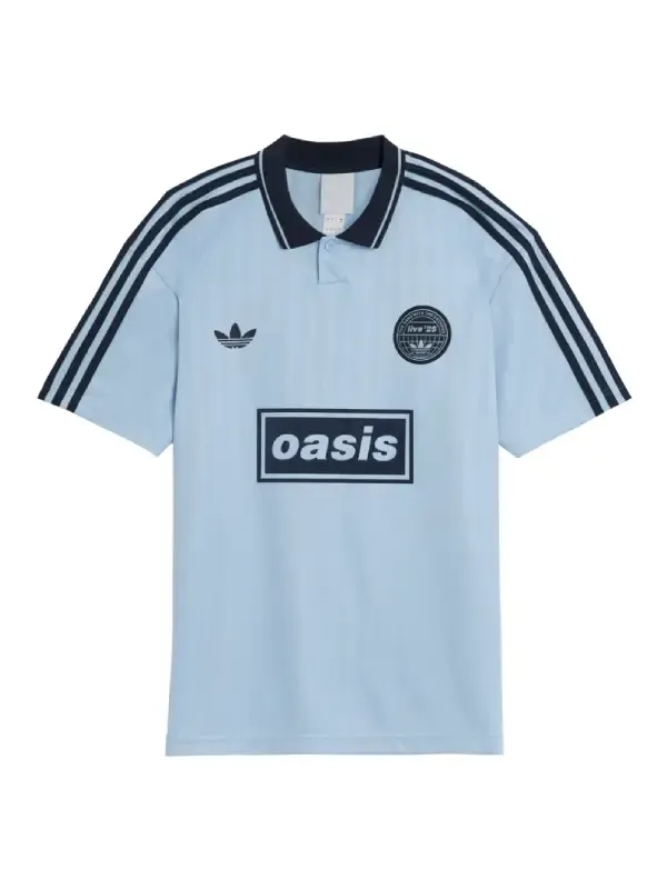 Adidas x Oasis Tour Jacquard Jersey clear sky blue front view with navy Oasis sponsor-block wordmark Adidas trefoil and Three Stripes sleeves