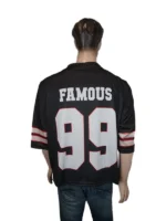 Billie Eilish Oversize Famous Jersey in a sleek onyx colorway with high-contrast white graphics and a polished, weighted drape.