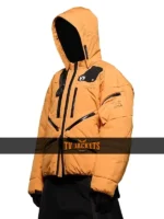 Death Stranding 2 orange jacket styling view showing streetwear fit, hooded collar, and bold futuristic appeal.