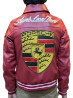 Front view of the Aimé Leon Dore x Porsche 993 red leather jacket featuring racing-inspired patches.