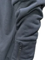 Close-up of the premium soft-brushed fleece texture and reinforced double-needle stitching.