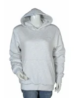 A man wearing a grey Madhappy Classics Midweight Hoodie with a hooded collar and kangaroo pockets.