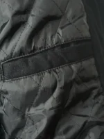 NCA Varsity Jacket showcasing the complete association aesthetic with a timeless black and white colorway.