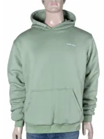 A model wearing an oversized black Madhappy Classics hoodie with dropped shoulders and a thick, structured hood.