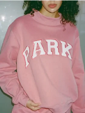 Women wearing a red and white Valentines Day Varsity Mockneck Sweatshirt.