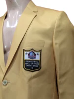 Tailored gold blazer with lapel collar and two-button closure.