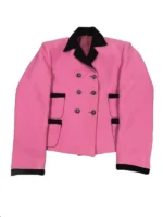 A woman wearing a black bouclé wool suit jacket with matching black buttons and a structured collar, inspired by the Kennedy silhouette.