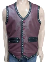 Michael Beck as Swan from The Warriors standing with a serious expression, wearing the signature sleeveless maroon leather vest with the gang's logo on the back.