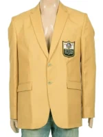 Front view of a structured gold blazer with chest insignia.