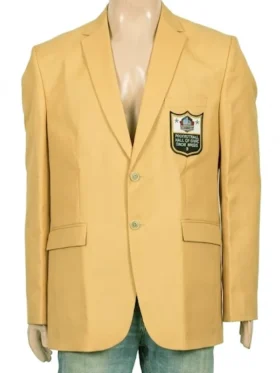 Front view of a structured gold blazer with chest insignia.