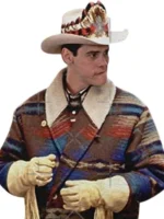 Jim Carrey as Lloyd Christmas wearing multicolor cowboy jacket with decorated cowboy hat in Dumb and Dumber 1994
