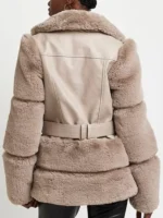 Back view of the Chanel Cresswell The Gentlemen fur jacket, highlighting the beige leather panels and thick fur banding on the sleeves.