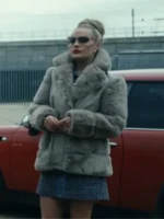 Chanel Cresswell as Sabrina wearing her chic winter fur jacket and sunglasses, showcasing the style from The Gentlemen TV series.