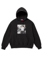 Close-up of Illegal Business Controls America graphic on Supreme x Anti Hero hoodie.