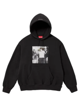 Close-up of Illegal Business Controls America graphic on Supreme x Anti Hero hoodie.