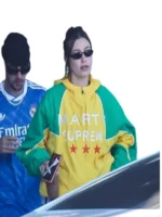 Close-up of the green and yellow Marty Supreme jacket patches.