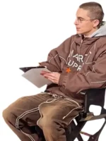 Close-up of the brown Marty Supreme jacket fabric and embroidery.