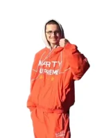 Full view of the fluorescent orange Marty Supreme varsity jacket.