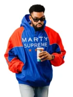 Full styling view of the royal blue and orange Marty Supreme jacket for a sporty look.
