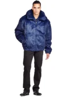 Full frontal view of a man wearing a navy Faux Fur Hooded Bomber Jacket. A cozy navy blue faux fur zip up bomber.