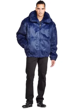 Full frontal view of a man wearing a navy Faux Fur Hooded Bomber Jacket. A cozy navy blue faux fur zip up bomber.