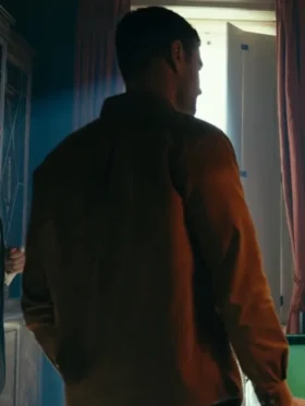 Back view of Theo James brown wardrobe shirt as Eddie Horniman, featuring a relaxed fit in The Gentlemen 2024 Eddie Horniman shirt.